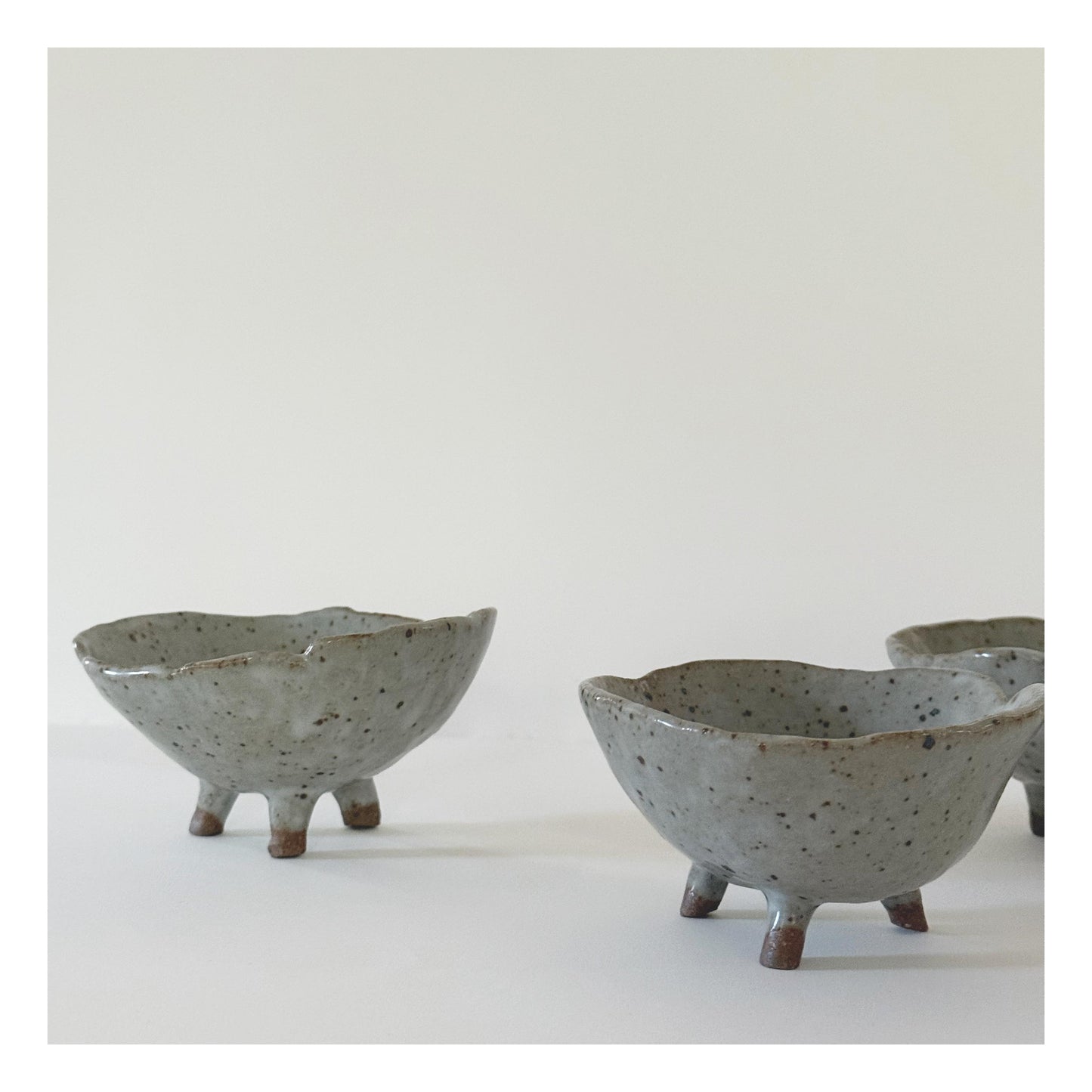 HANDMADE FOOTED CERAMIC BOWLS